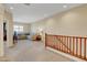 Upstairs living room with comfortable seating and natural light at 1560 Plaza Centre Dr # 103, Las Vegas, NV 89135