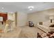 Open-concept living area with plush sofa and bar seating, great for entertaining at 1560 Plaza Centre Dr # 103, Las Vegas, NV 89135