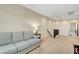 Cozy loft area with neutral paint, carpet, and furniture; perfect for relaxing or entertaining guests at 1560 Plaza Centre Dr # 103, Las Vegas, NV 89135