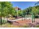 A picturesque playground with swings and climbing structures, perfect for outdoor fun and Gathering activities at 1560 Plaza Centre Dr # 103, Las Vegas, NV 89135