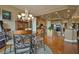 Dining area featuring hardwood floors and seamless transition to the open kitchen at 1704 River Birch St, Las Vegas, NV 89117