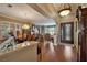 Elegant dining room with hardwood floors, a chandelier, and a grand dining table set for a formal meal at 1704 River Birch St, Las Vegas, NV 89117