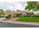Charming single-story home with a lush, green lawn, mature landscaping, and a welcoming facade at 1704 River Birch St, Las Vegas, NV 89117