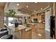 Bright kitchen with granite countertops, an island, and stainless-steel appliances. Perfect for cooking and entertaining at 1704 River Birch St, Las Vegas, NV 89117