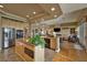 Well-equipped kitchen with stainless steel appliances and a granite-topped island creates a stylish and functional space at 1704 River Birch St, Las Vegas, NV 89117