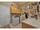 Well-equipped laundry room with cabinets and countertop space at 1704 River Birch St, Las Vegas, NV 89117