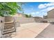 Large backyard featuring a tiered patio area, mature trees and a private setting at 1808 Peyton Stewart Ct, North Las Vegas, NV 89086