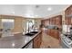 Well-equipped kitchen with a large island, stainless steel appliances, and abundant storage at 1808 Peyton Stewart Ct, North Las Vegas, NV 89086