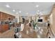 Open floor plan with a kitchen that flows into the living and dining areas, perfect for entertaining at 1808 Peyton Stewart Ct, North Las Vegas, NV 89086