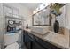 Bathroom featuring a vanity with a vessel sink, shelving, and a large mirror at 1916 Canosa Ave, Las Vegas, NV 89104