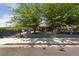 Charming home with an eye-catching wrought-iron gate and mature trees, offering both curb appeal and privacy at 1916 Canosa Ave, Las Vegas, NV 89104