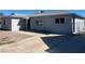 A single-story home featuring a side entrance and updated windows at 2036 Canosa Ave, Las Vegas, NV 89104
