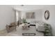 Bright living room with neutral decor, modern furniture, and minimalist artwork at 207 E Van Wagenen St, Henderson, NV 89015