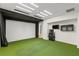 Bonus room with a golf simulator at 2436 Grassy Spring Pl, Las Vegas, NV 89135