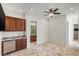 Bonus room with a ceiling fan, and a sink with stainless steel fridge at 2436 Grassy Spring Pl, Las Vegas, NV 89135