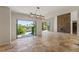 Open floor plan to private backyard oasis with swimming pool and stone fireplace at 2436 Grassy Spring Pl, Las Vegas, NV 89135