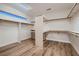 Walk-in closet offers ample storage with built-in shelves and rods for organizing clothes and accessories at 2448 Ram Crossing Way, Henderson, NV 89074