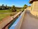 Balcony view overlooking a golf course and mountain range, complete with a water feature at 2448 Ram Crossing Way, Henderson, NV 89074