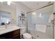 Bathroom featuring a single sink vanity and glass enclosed shower at 2669 Via Monet, Henderson, NV 89044
