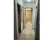 Bathroom view with tile flooring leading to the sink, toilet, and pink bathtub at 2773 Heritage Ct, Las Vegas, NV 89121