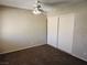 Bedroom view showcasing carpeting, closet with sliding doors, ceiling fan with lights, and electrical outlets at 2773 Heritage Ct, Las Vegas, NV 89121