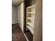 Hallway closet with shelves and sliding doors at 2773 Heritage Ct, Las Vegas, NV 89121