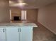 Spacious living room featuring tile flooring, fireplace and natural light at 2773 Heritage Ct, Las Vegas, NV 89121