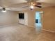 Open living space featuring a wet bar and entrance to the kitchen at 2773 Heritage Ct, Las Vegas, NV 89121