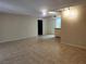 Open-concept living space featuring tile floors and seamless flow to the kitchen area at 2773 Heritage Ct, Las Vegas, NV 89121