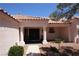 Inviting front entrance with decorative pillars, window box and landscaping, offering curb appeal at 2820 Bluff Point Dr, Las Vegas, NV 89134