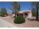 Charming single-story home featuring desert landscaping, well-maintained lawn and curb appeal at 2820 Bluff Point Dr, Las Vegas, NV 89134