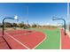 Community basketball court with multiple hoops and colorful playing surface at 2870 Turnstone Ridge St, Henderson, NV 89044