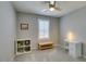 Bedroom features a ceiling fan, carpet, and window at 2870 Turnstone Ridge St, Henderson, NV 89044