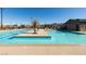 Large community pool with lounge chairs and a pool house at 2870 Turnstone Ridge St, Henderson, NV 89044