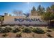 Entrance sign to the Inspira community with attractive landscaping at 2870 Turnstone Ridge St, Henderson, NV 89044