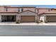 Attractive townhome featuring a private two car garage, desert landscaping and private entry at 2870 Turnstone Ridge St, Henderson, NV 89044