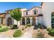 Charming townhome with landscaped front yard and covered porch entry way at 2870 Turnstone Ridge St, Henderson, NV 89044