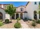 Inviting two-story home with a landscaped front yard and cozy entrance at 2870 Turnstone Ridge St, Henderson, NV 89044