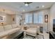 Open-concept living room and dining area with ample seating and abundant natural light at 2870 Turnstone Ridge St, Henderson, NV 89044