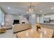 Open-concept living space integrates dining area, stairs, and living room for a bright and inviting atmosphere at 2870 Turnstone Ridge St, Henderson, NV 89044