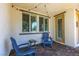 Relaxing outdoor patio with comfortable seating and string lights at 2870 Turnstone Ridge St, Henderson, NV 89044