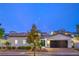 Charming single-story home featuring manicured landscaping, warm brick driveway, and a two-car garage at 3020 Via Venezia, Henderson, NV 89052