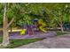 Neighborhood playground with colorful slides, climbing equipment and trees providing ample shade at 3020 Via Venezia, Henderson, NV 89052