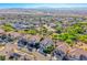 Aerial shot of a residential area showcasing well-maintained homes and proximity to McCarran International Airport at 3050 Whispering Crest Dr, Henderson, NV 89052