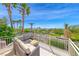 Expansive balcony features outdoor seating and views of the golf course at 3050 Whispering Crest Dr, Henderson, NV 89052