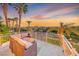 Enjoy scenic views from this cozy balcony with comfortable seating and a warming heater at 3050 Whispering Crest Dr, Henderson, NV 89052
