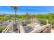 Relaxing balcony with comfortable seating and stunning views of the lush landscape at 3050 Whispering Crest Dr, Henderson, NV 89052
