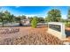 Welcome to Puccini Park featuring green trees, a building, and an informational sign with a clear blue sky at 3050 Whispering Crest Dr, Henderson, NV 89052