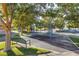 A pleasant community park featuring a playground and comfortable green benches for relaxation at 3050 Whispering Crest Dr, Henderson, NV 89052