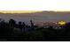 Breathtaking view of the city skyline and mountains at twilight at 3050 Whispering Crest Dr, Henderson, NV 89052